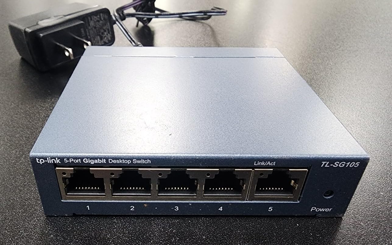TP-Link TL-SG105, 5 Port Gigabit Unmanaged Ethernet Switch, Network Hub, Ethernet Splitter, Plug & Play, Fanless Metal Design, Shielded Ports, Traffic Optimization customer photo 1