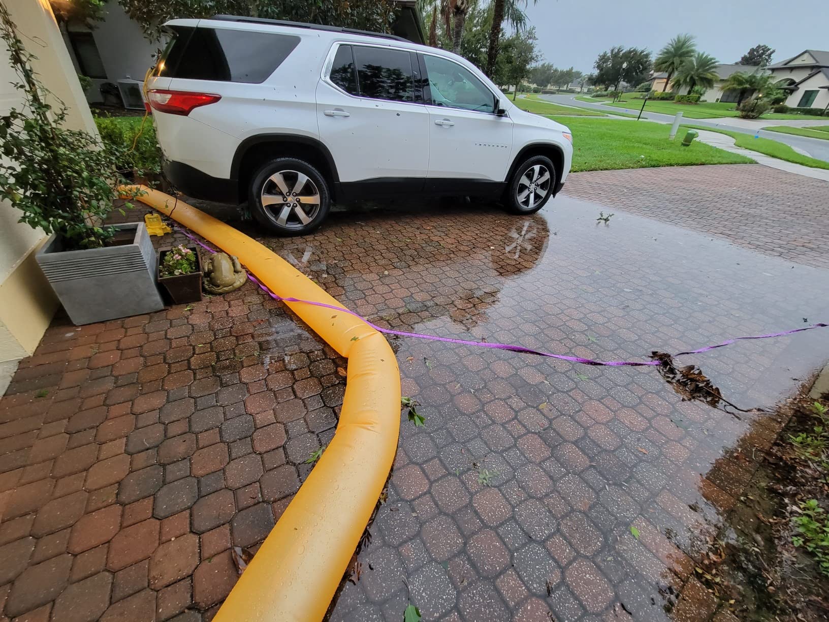 The Original HydraBarrier Ultra Flood Barrier - 6 ft Long x 6 in High - Light, Reusable Sandbag Alternative - Flood Control & Diversion Tube for Home, Garage, Door & Property Protection customer photo 2