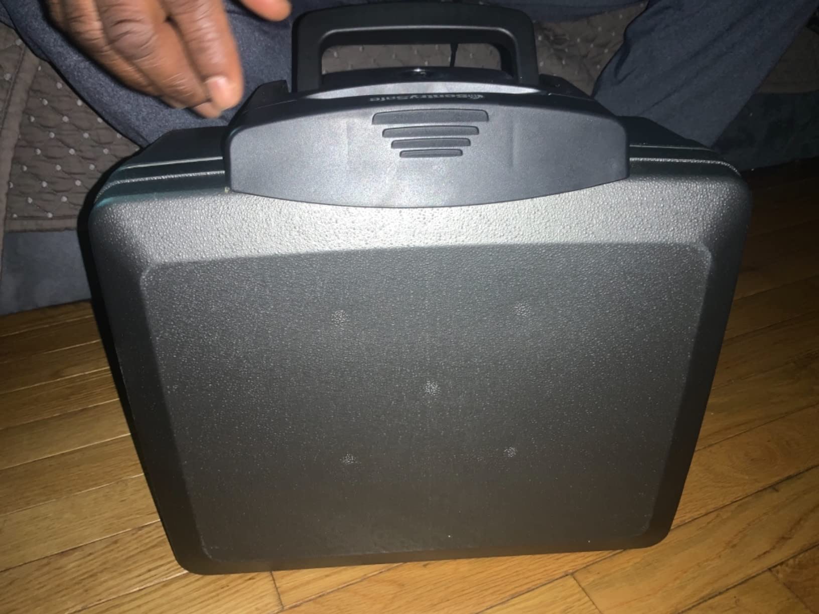 SentrySafe Fireproof and Waterproof Safe, Black Portable Lock Box with Key Lock and Carrying Handle for Money, Passport, H0100 customer photo 2