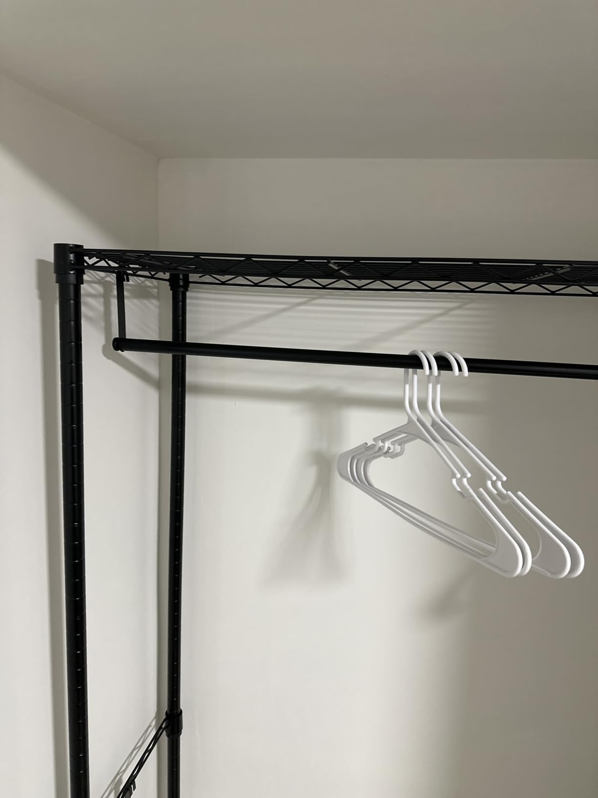 Amazon Basics Adjustable Double Rod Rolling Garment Rack, Hanging Clothes Closet Organizer with Wheels, Heavy Duty, 36 x 14 x 72, Black customer photo 2