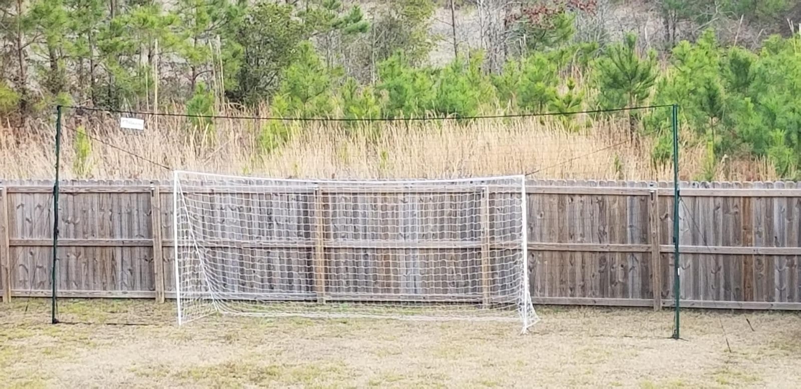 Open Goaaal Soccer Goal, Rebounder and Backstop Net | All-in-one backyard system; continuous shooting practice and missed-shot protection customer photo 2