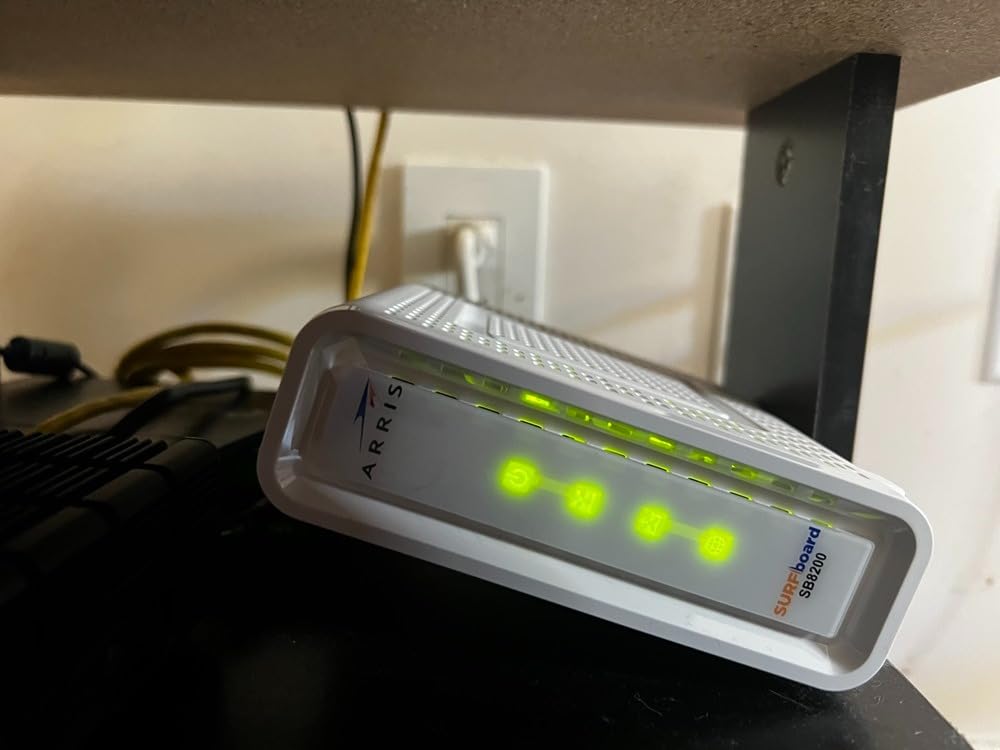 ARRIS SURFboard SB8200 DOCSIS 3.1 Cable Modem | Up to 1 Gbps Plans | Two 1 GbE ports deliver up to 2 Gbps wired aggregate; works with Xfinity, Cox, Spectrum; modem only, router required. customer photo 2