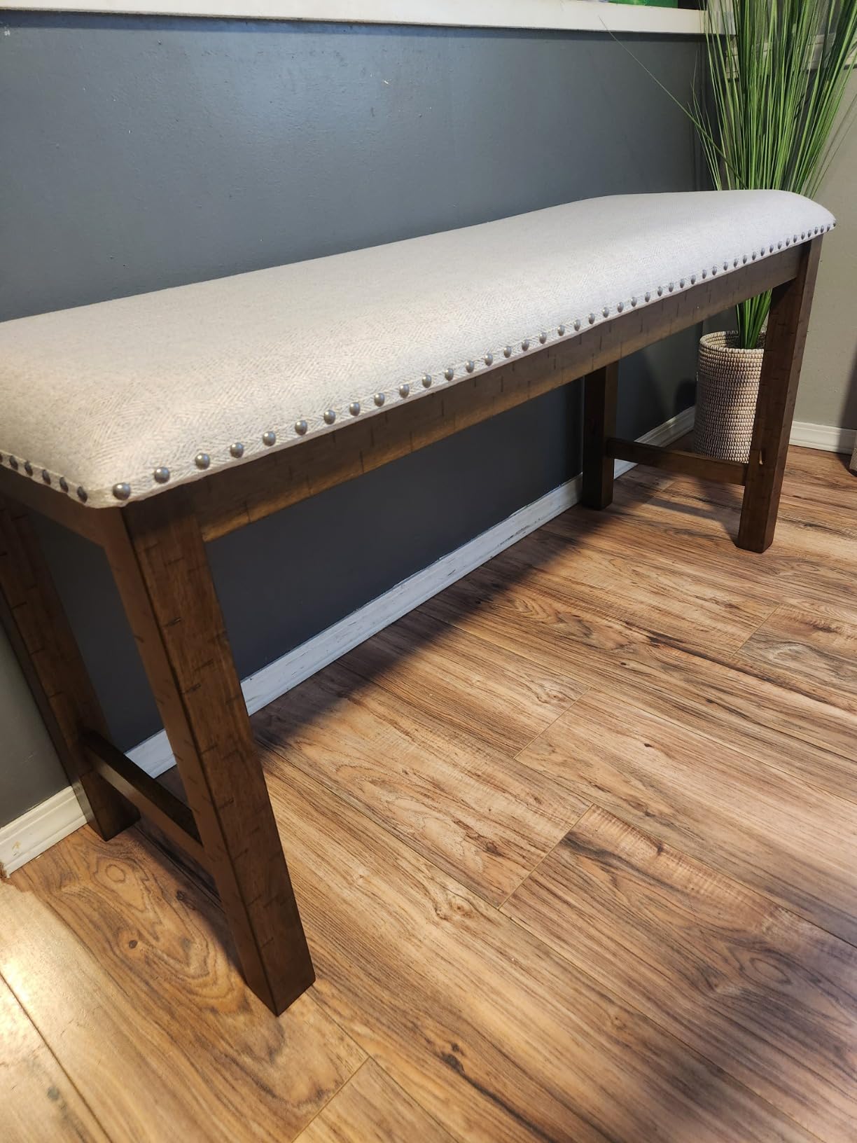 Signature Design by Ashley Moriville Wood Upholstered Dining Bench, Beige | Cushioned 48-inch dining seat in textured beige polyester, Rustic distressed nutmeg wood frame with bronze nailhead trim customer photo 2