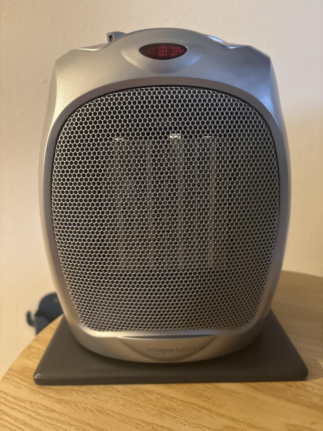 Amazon Basics Ceramic Space Heater, Portable Indoor Heating Solution, With Overheat and Tip-Over Protection, Thermostat, Non-Oscillating, 1500W, Fast Heating, 7.52