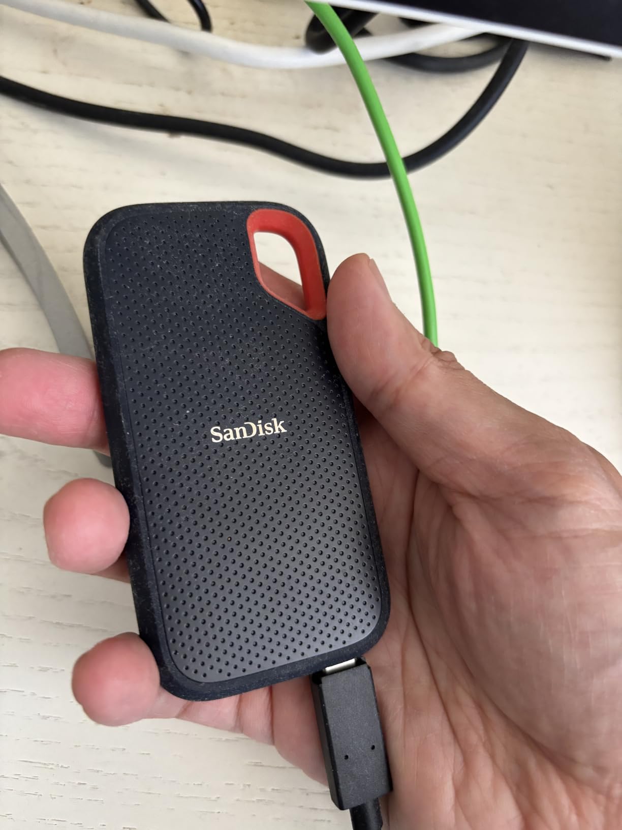 SanDisk 2TB Extreme Portable SSD, Up to 1050MB/s Read Speeds, IP65 Water & Dust Resistance, 256-bit AES Encryption, USB-C 3.2 Gen 2 customer photo 1