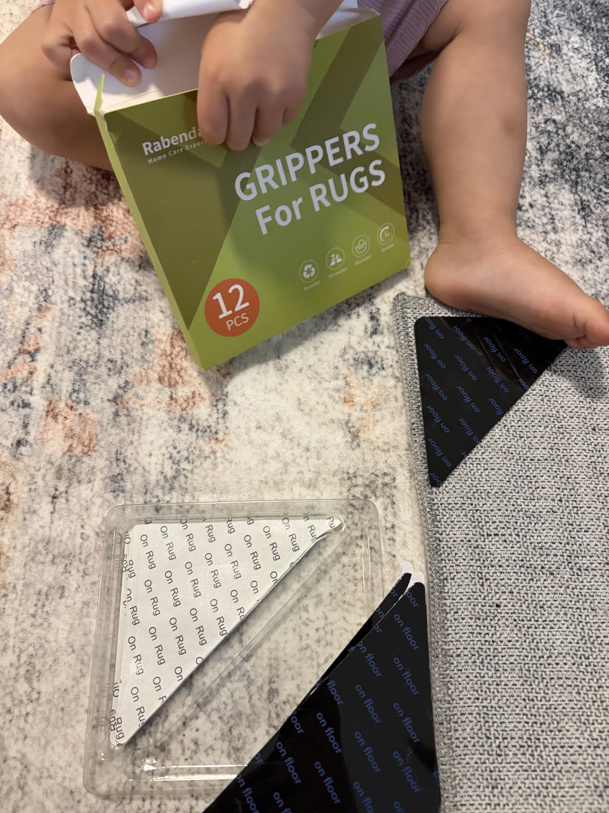 Rabenda Rug Tape Gripper for Hardwood Floors No Damage, 12 Pcs Carpet Tape | Double Sided Rug Stickers for Wood Floor, Non Slip Rug Pads for Area Rugs, Reusable, Keeps Corners Flat, Washable, Black customer photo 2