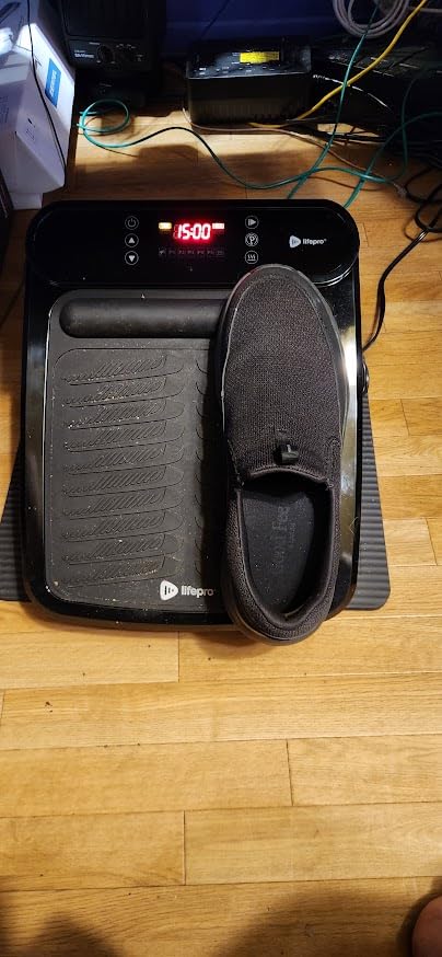 LifePro VibraFlow Feet Massager Electric Comfort & Circulation Support | Supports circulation with 30 customizable speeds, 10 preset modes, a magnetic remote holder, and dual textured pads. customer photo 1