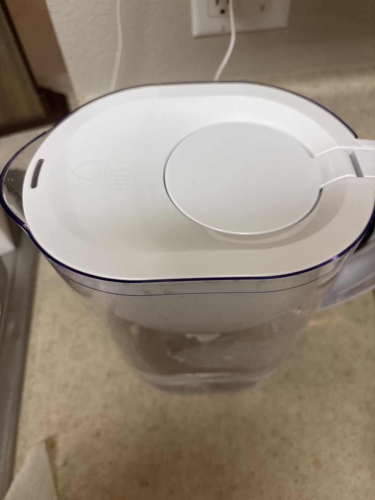Brita Large Water Filter Pitcher for Tap and Drinking Water with SmartLight Change Indicator, Includes 1 Standard Filter, BPA-Free, Lasts 2 Months, 10-Cup Capacity, Bright White customer photo 1