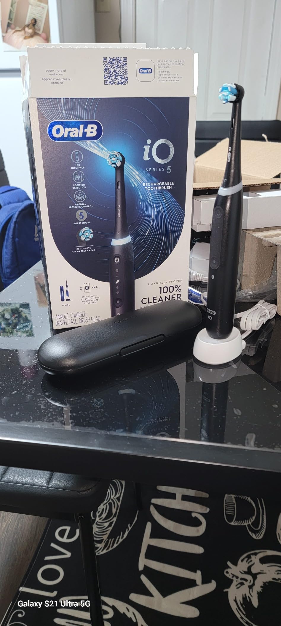 Oral-B Rechargeable Electric Toothbrush, iO5 Customizable Clean, 5 Cleaning Modes, Visual Pressure Sensor to Protect Gums, Travel Case, Black customer photo 1