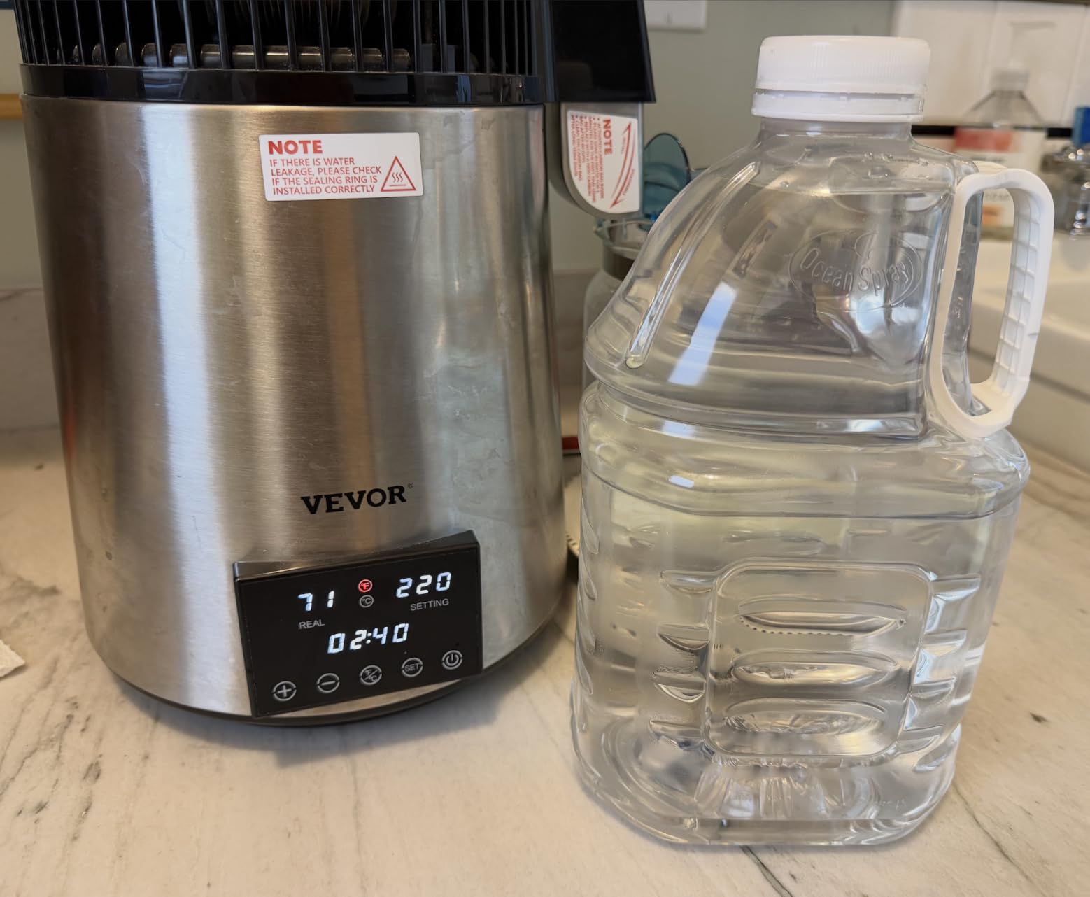 VEVOR 1.1Gal Water Distiller, 0.4Gal/H, Distilled Water Maker Machine 1750W 0-99H Timing Dual Temp Display, 304 Stainless Steel Countertop Distiller Glass Carafe Cleaning Powder 3 Carbon Packs, Silver customer photo 2