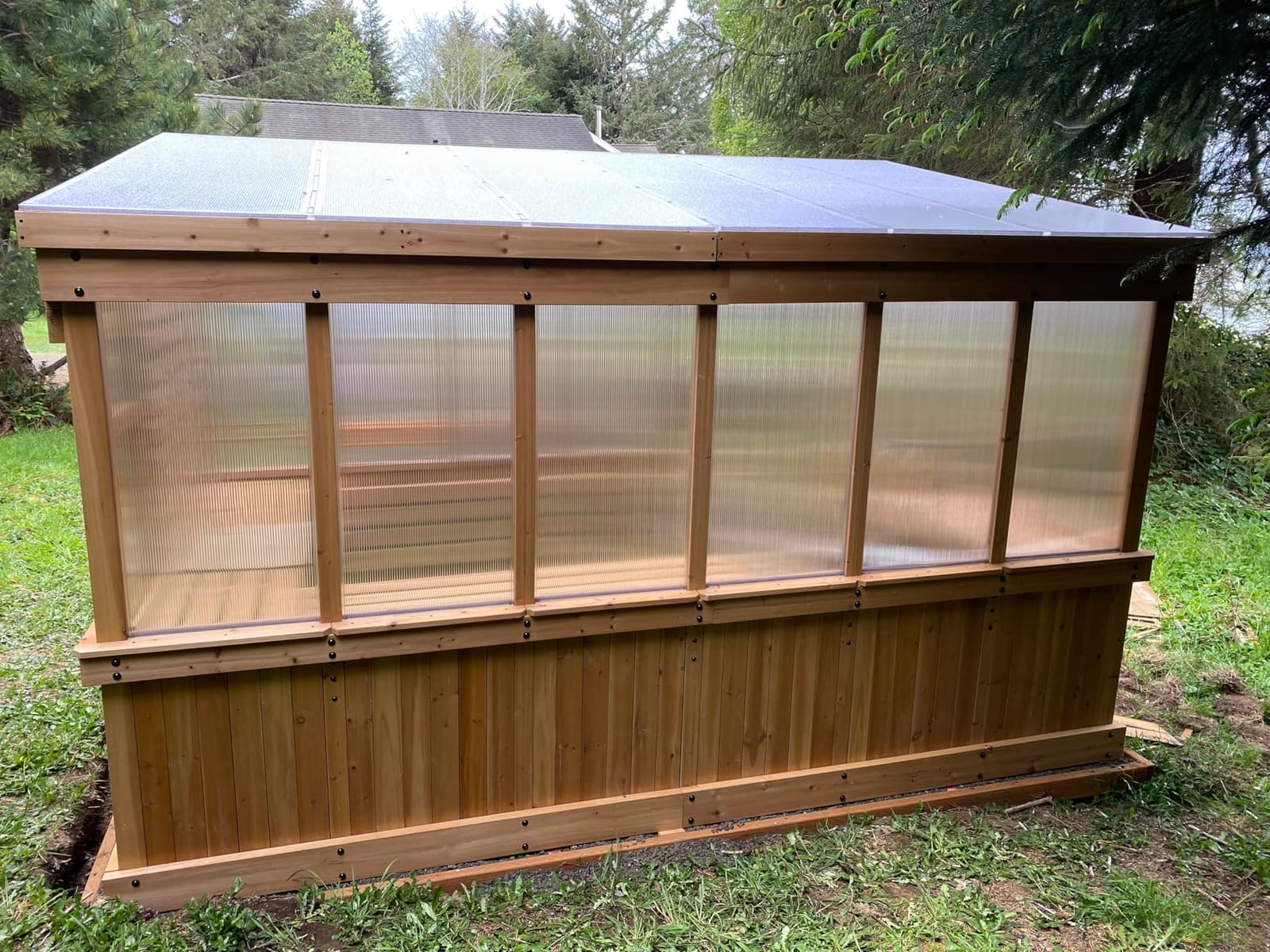 Backyard Discovery Willow 9' x 6' Cedar Wood and Polycarbonate Walk-in Greenhouse Kit with Exhaust Fan, Windows, Hose Hook-Ups, PowerPort, Staging Shelves for Year-Round Outdoor Gardening customer photo 1
