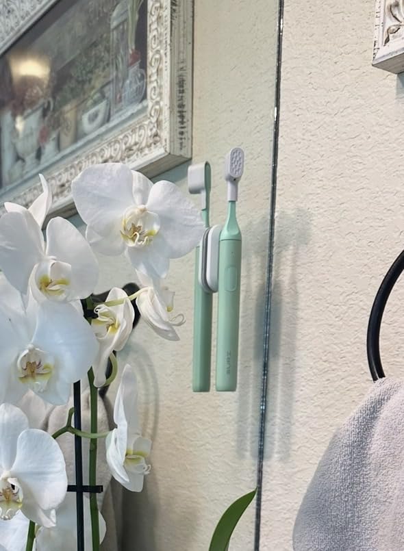 SURI Pro Sonic Electric Toothbrush | Pressure Sensor | Aluminium Body | 2-Minute Timer | Plant-Based Heads | Green customer photo 2
