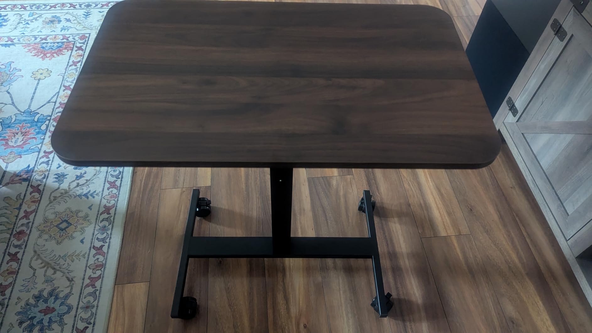 HUANUO Small Rolling Laptop Standing Desk, Height Adjustable Mobile T-Base Desk with Lockable Casters (Walnut) customer photo 2