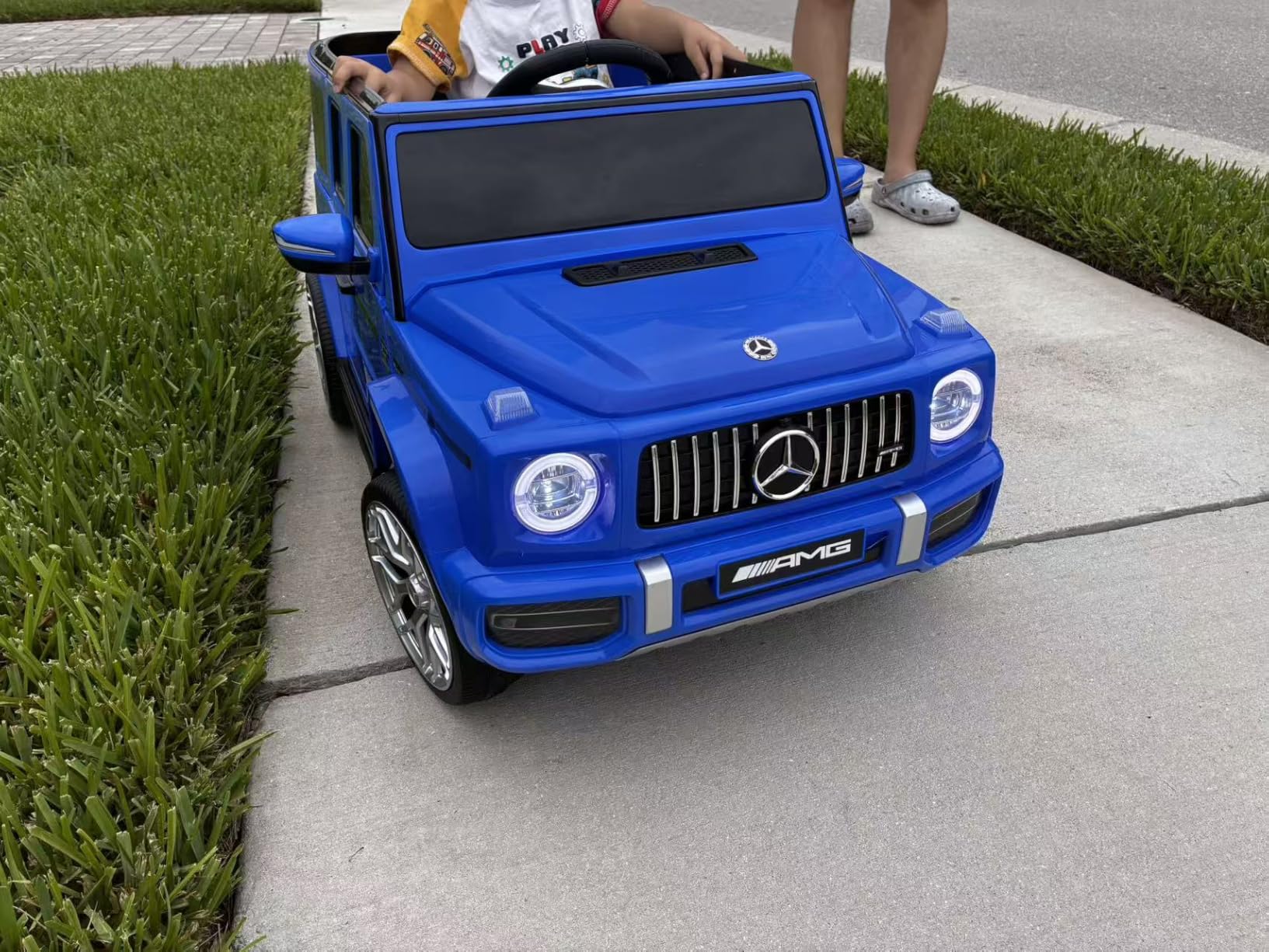 ELEMARA Licensed Mercedes-Benz AMG G63 Ride on Toys, Electric Car for Kids W/Parents Control, Electric Powered G Wagon Ride On Truck Toy, Low Battery Prompt, Bluetooth, Flickering Lights/LED Lights, White customer photo 1