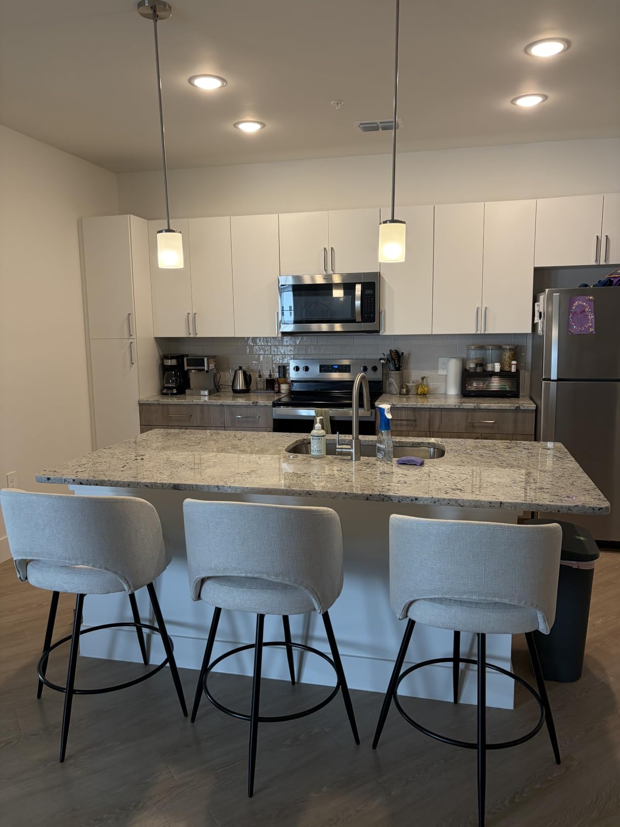 LUE BONA 26''H Swivel Bar Stools Set of 3, Counter Height Bar Stools with Backs, Lumbar Pillow and Black Metal Frames, Upholstered Modern Barstools for Kitchen Island, Linen Farbic, Linen Color customer photo 2