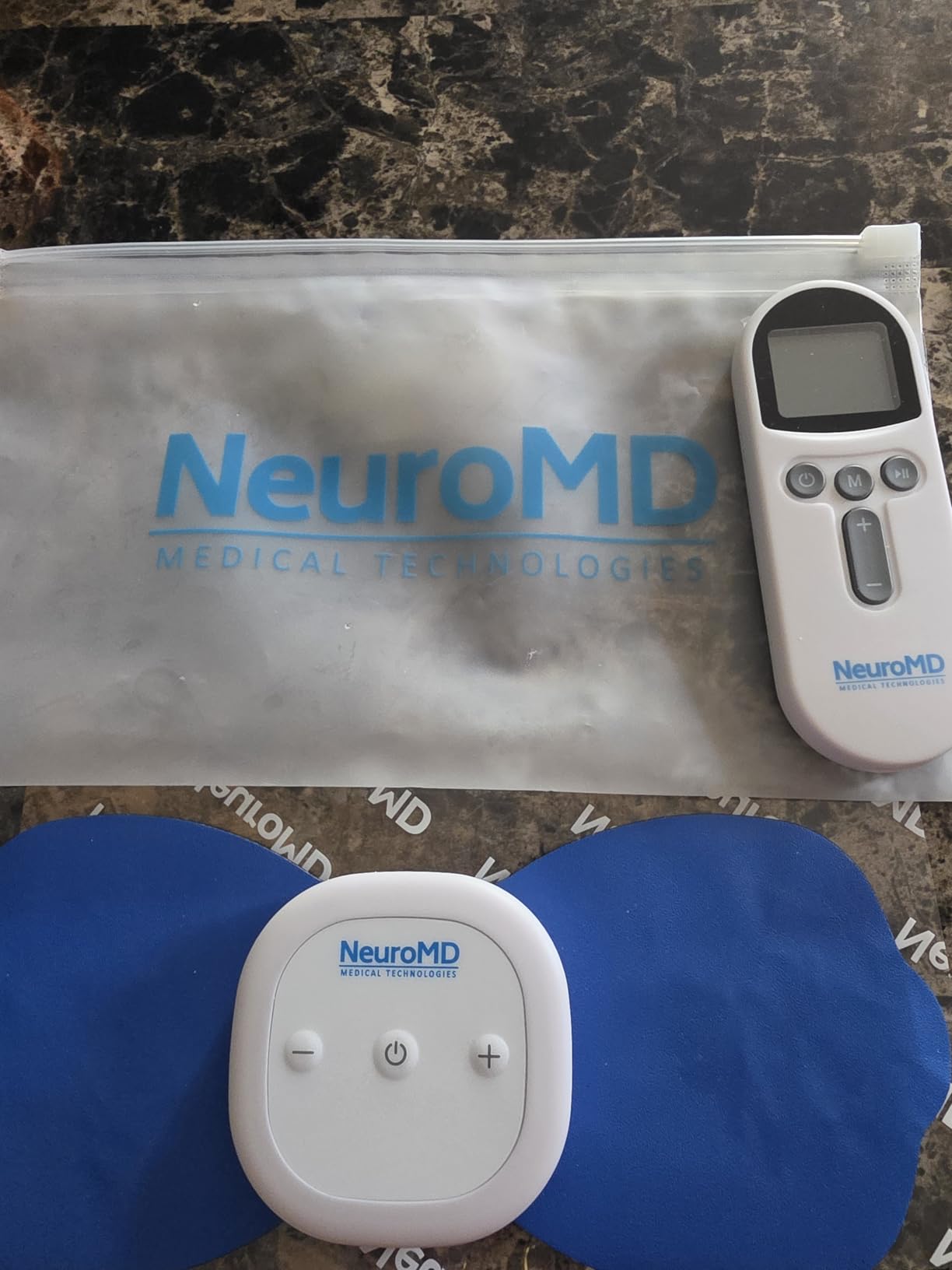 NeuroMD NMES Wireless Muscle Stimulator - Portable Device for Temporary Relief of Pain Due to Sore/Aching Muscles, Model SM9113 customer photo 1