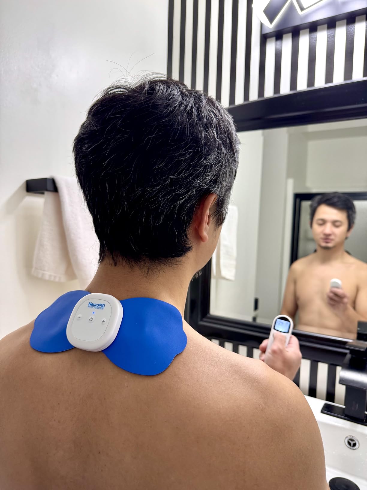 NeuroMD NMES Wireless Muscle Stimulator - Portable Device for Temporary Relief of Pain Due to Sore/Aching Muscles, Model SM9113 customer photo 2
