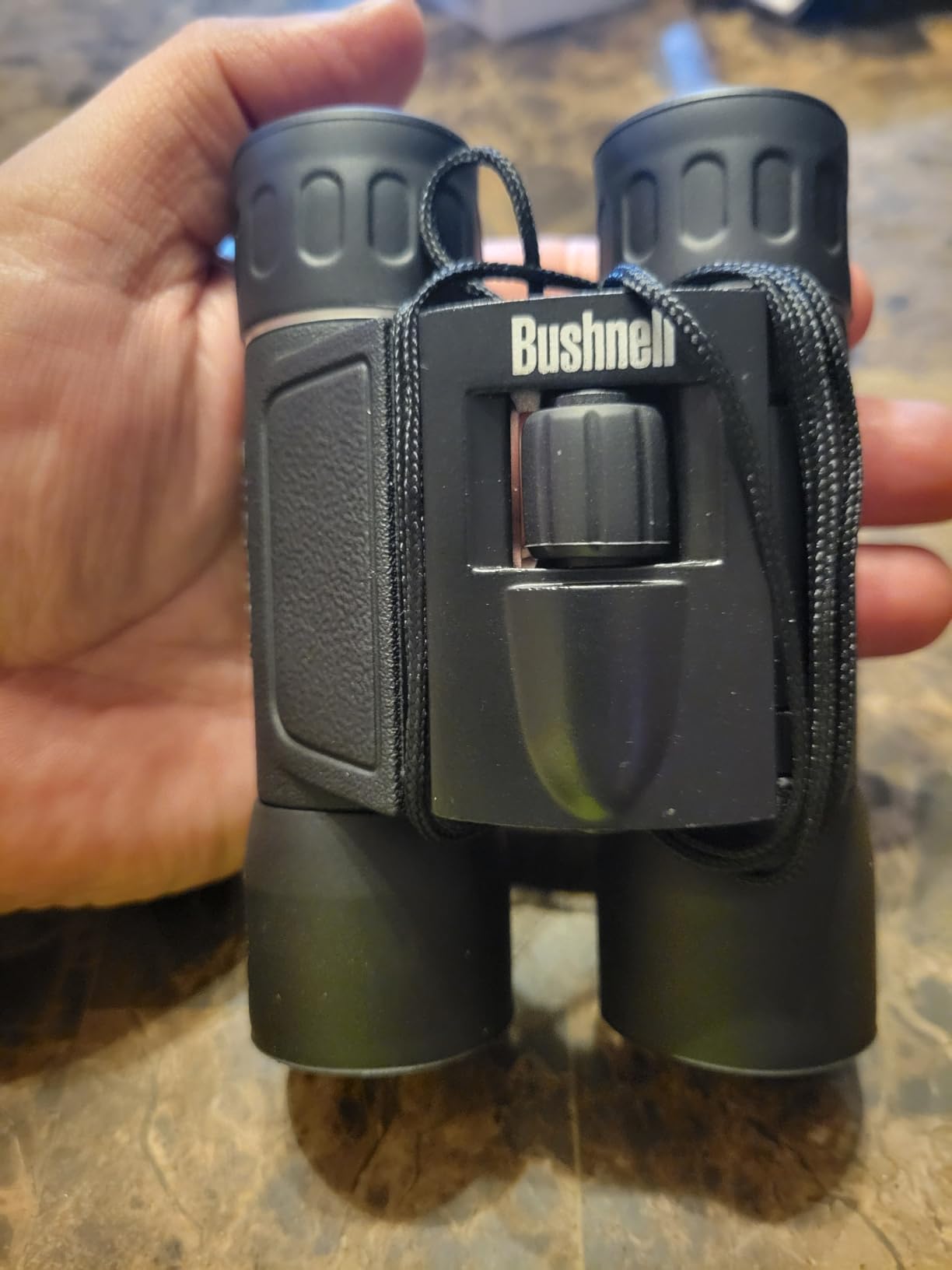 Bushnell 10x25 Powerview Binoculars, Compact Folding Roof Prism, for Adults and Kids, Concerts, Birdwatching, Hiking, Sports, Rubber Armor (132516C) customer photo 1