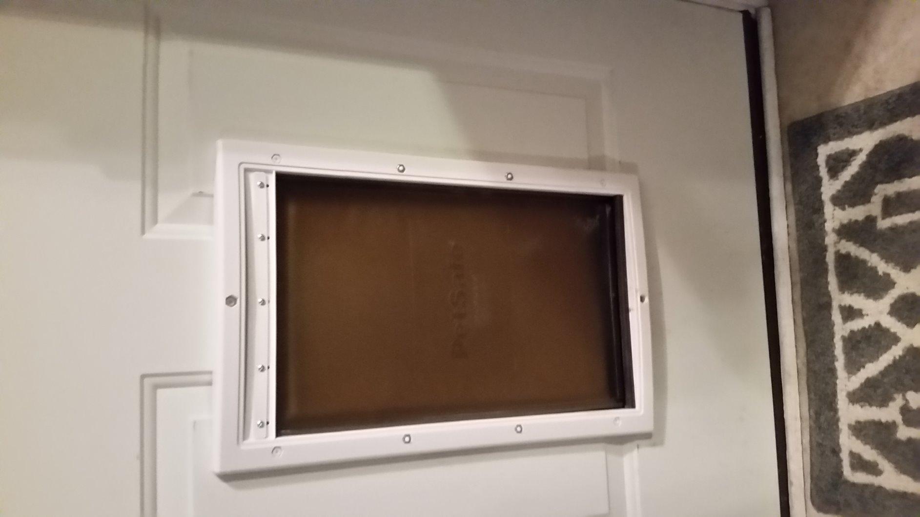 PetSafe Extreme Weather Plastic Pet Door, Insulated 3-Flap, Large | Insulated 3-Flap System Rated -10 to 100F, Paintable Plastic Frame, DIY Install in Doors 1 5/8-2 1/4in Thick. customer photo 1