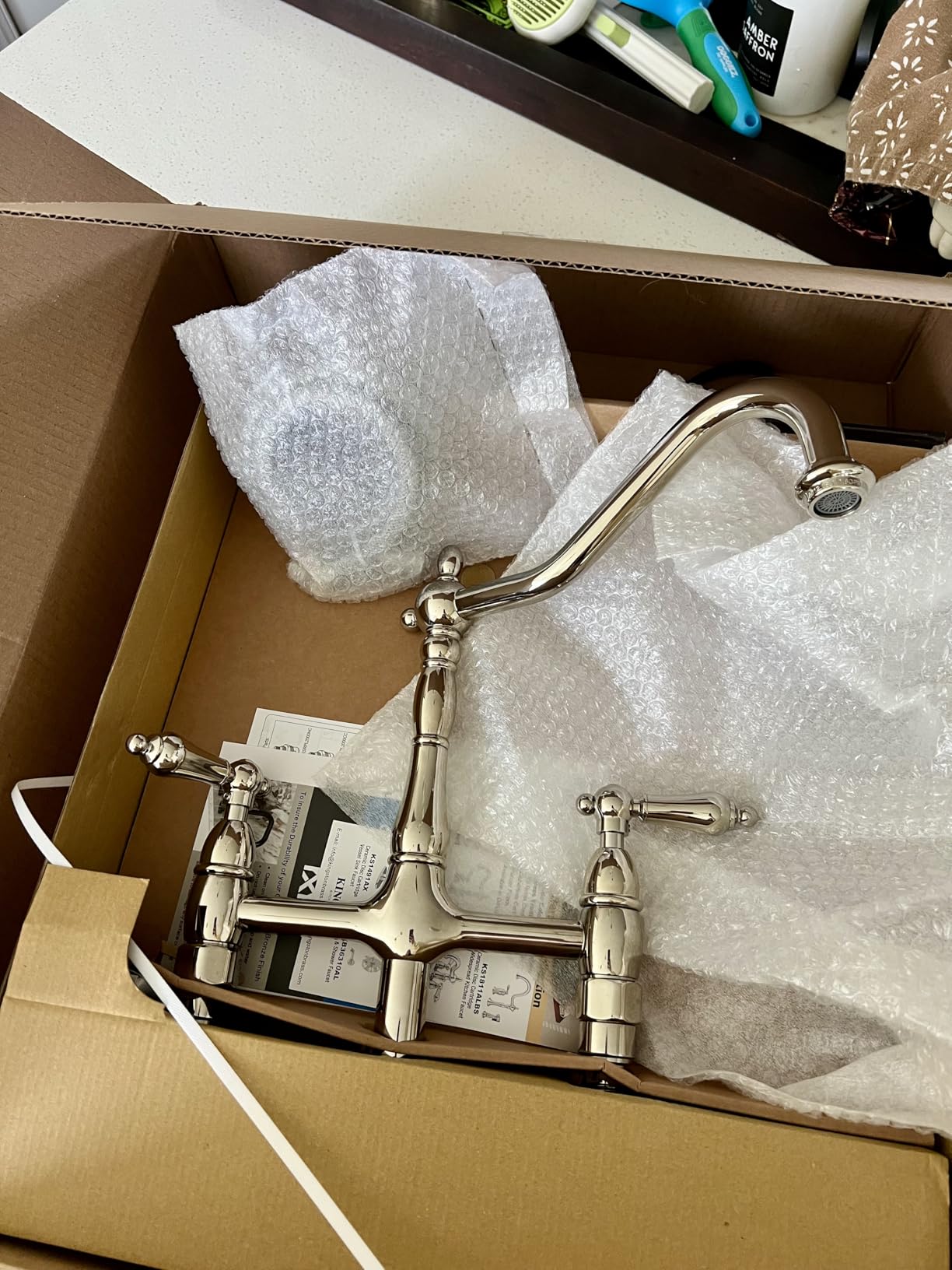 Kingston Brass KS1273ALBS Heritage 8-Inch Kitchen Bridge Faucet with Brass Sprayer, Antique Brass customer photo 2