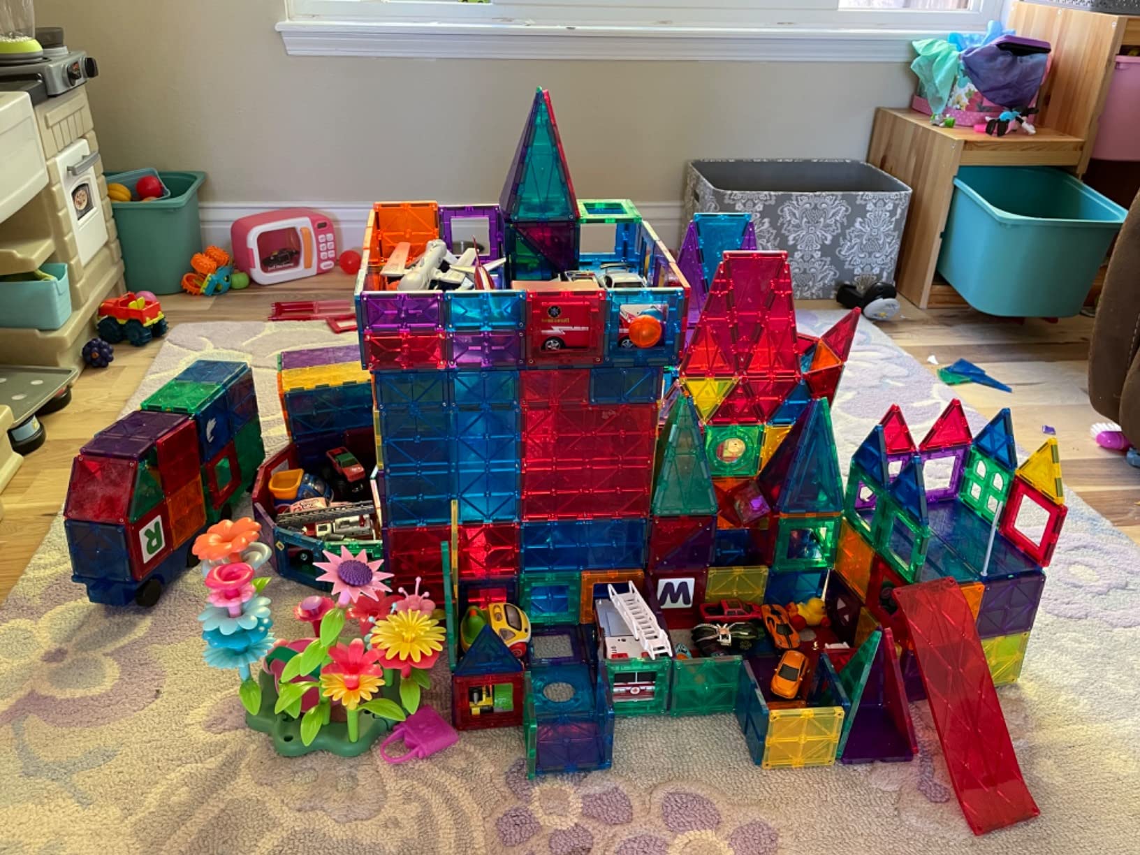Magnetic Tiles for Kids 100-Piece Set, STEM Educational Building Blocks, Includes 2 Cars & Click-in ABC Learning Tiles, Gift for Boys & Girls, Magnetic Figures & 2 or 4 Car Set Add-Ons Available customer photo 1