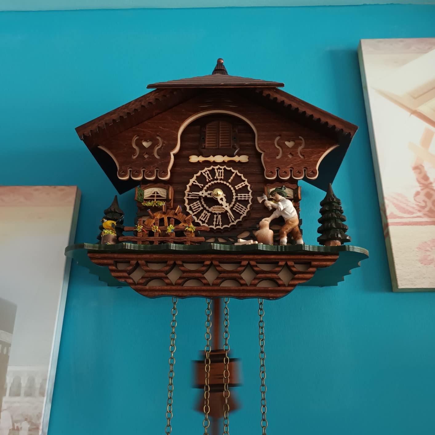 Trenkle Quartz Cuckoo Clock Black Forest House with Moving Wood Chopper and Mill Wheel, with Music TU 4217 QM customer photo 2