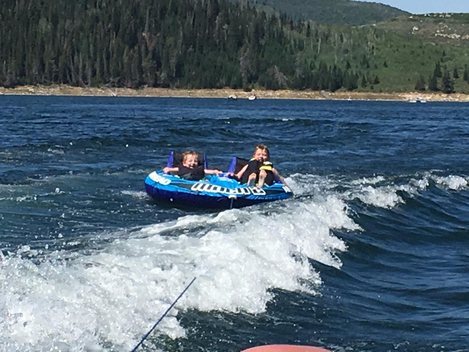 Airhead Mach Towable Tube for Boating, 1-3 Rider Inflatable Boat Tube for Water Tubing, Cockpit Design, Kwik-Connect Tow System, Foam Padded Handles w/Knuckle Guard, Speed Safety Valve customer photo 2