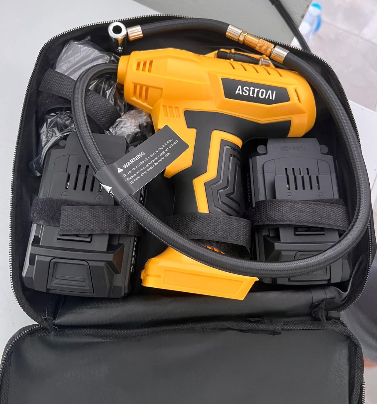 AstroAI Cordless Tire Inflator Portable Air Compressor 160PSI 12VDC Battery | Dual Power Supply Auto Shut-Off Digital Pressure Gauge Fast Inflation Air Pump for Cars Motorcycles Bikes Ball Gift Yellow customer photo 1