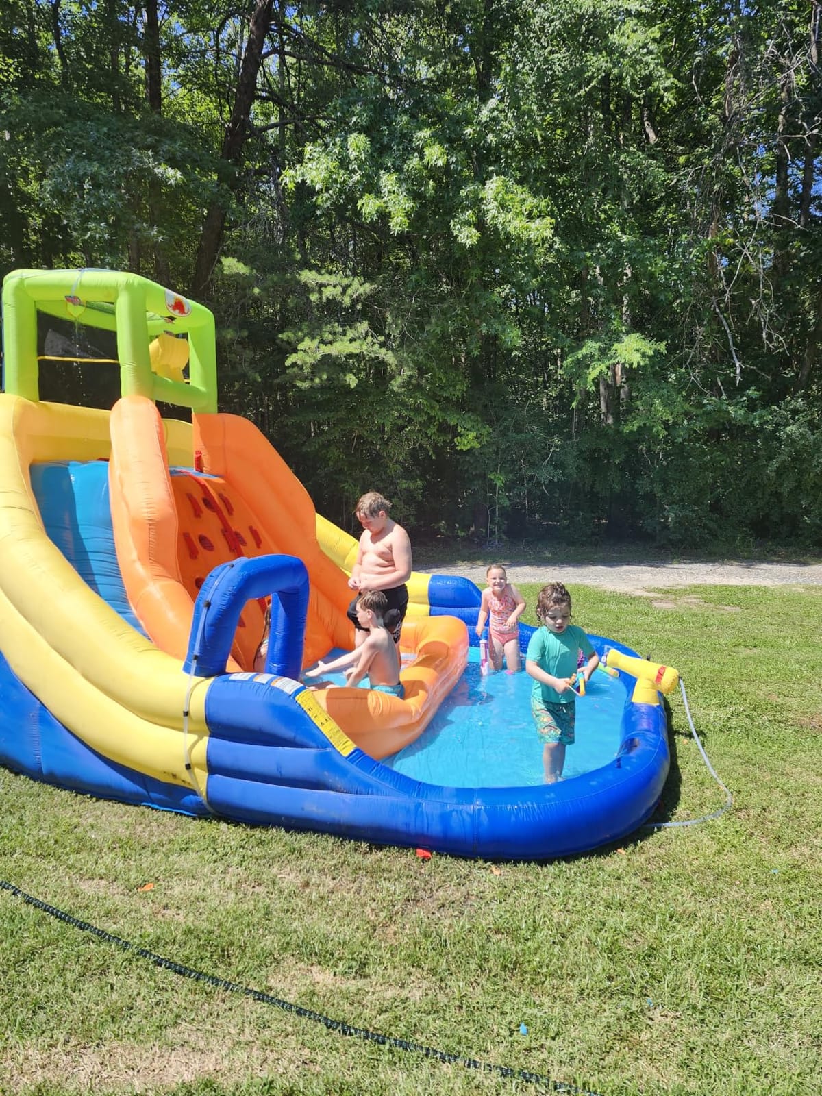 WELLFUNTIME Inflatable Water Slide, Bounce House with Water Bucket, Deep Pool, Climbing Wall with Rope, Bouncy Castle with Air Blower customer photo 1