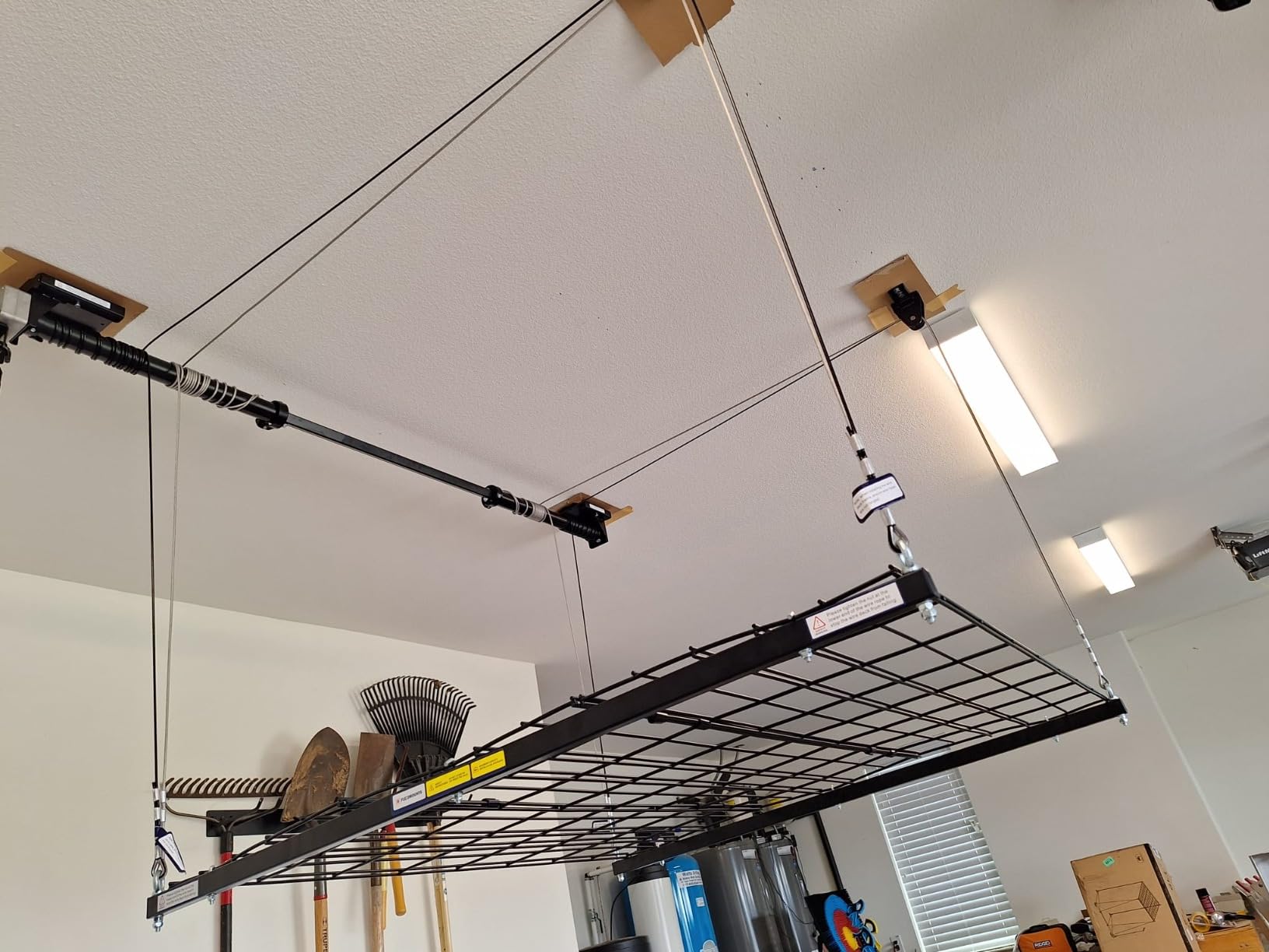 FLEXIMOUNTS GL1 Overhead Garage Lifting Storage Rack, 4x4 Ft Heavy-Duty Metal Garage Ceiling Rack, Adjustable Organization System With 71''L Axle, 350lbs Weight, Black customer photo 2