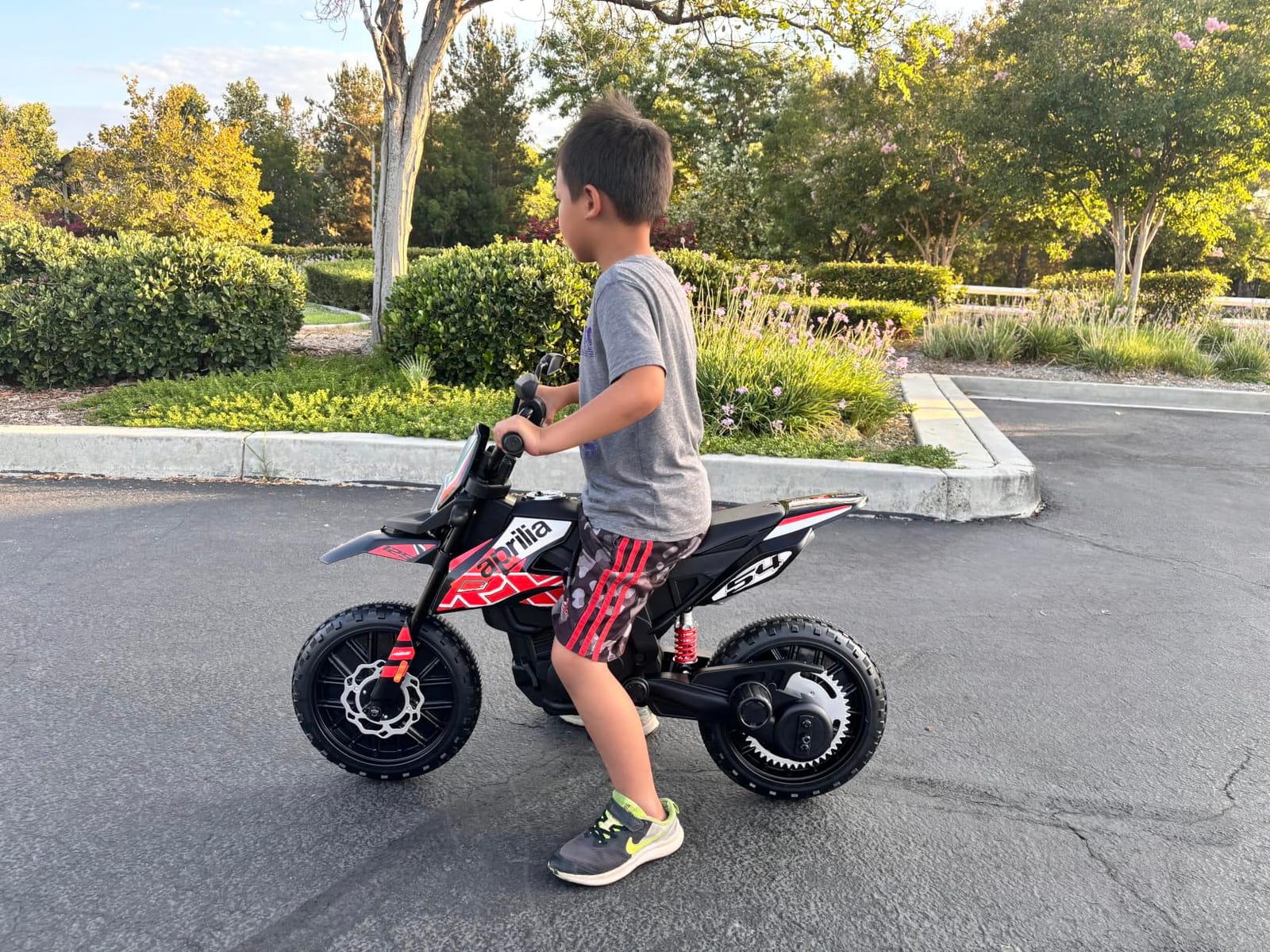 OLAKIDS Kids Motorcycle, Licensed Aprilia RX125 12V Ride on Electric Dirt Bike Motorbike with Training Wheels, Spring Suspension, Bluetooth, USB, Lights customer photo 1