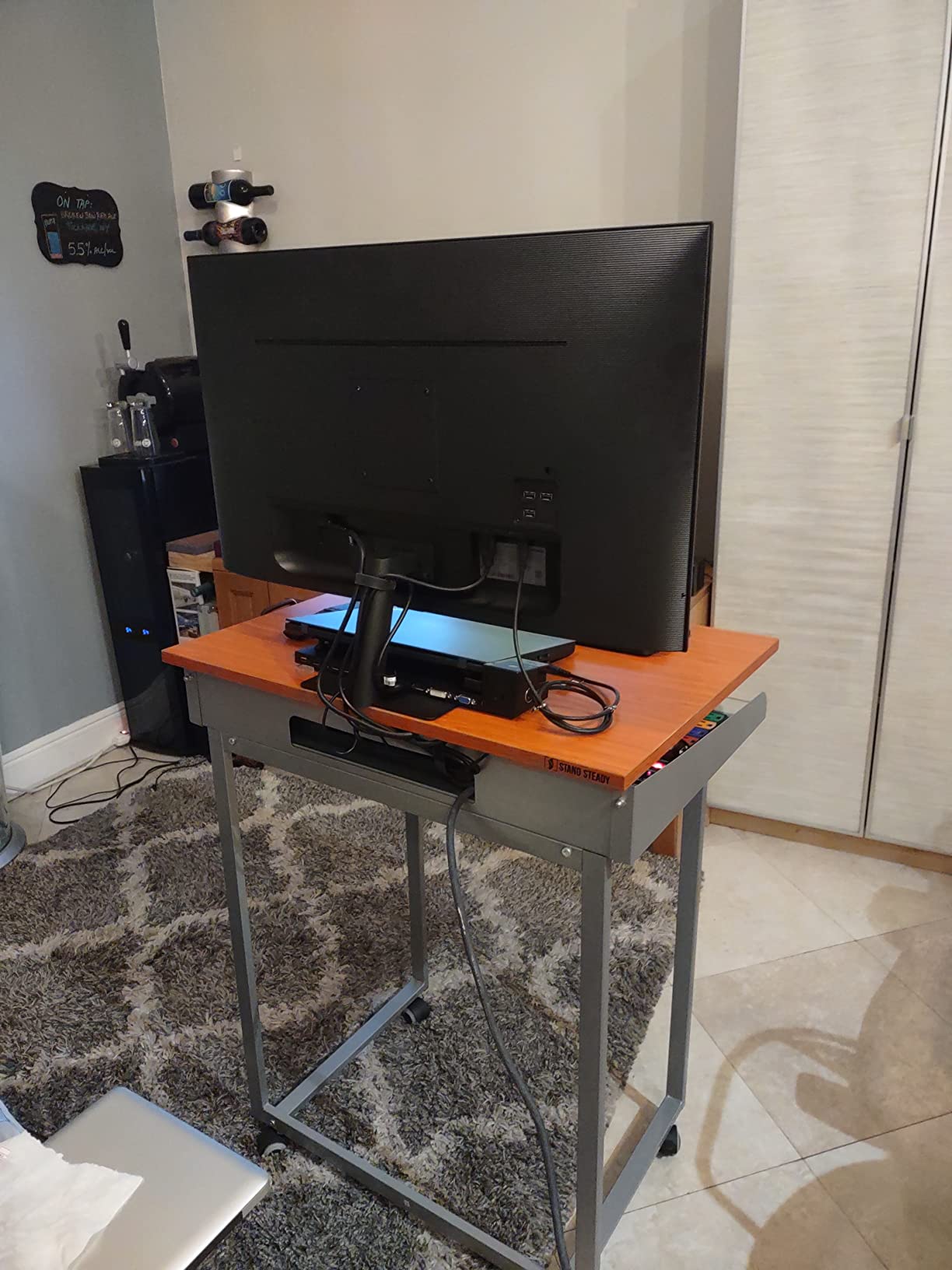 Stand Steady X-Elite Pro, Ergonomic Adjustable Height Standing Desk Converter for Home or Office, Easy Lift Sit to Stand Laptop Desk Riser for Laptop and Computer Monitor (Black, 28in x 20in) customer photo 1