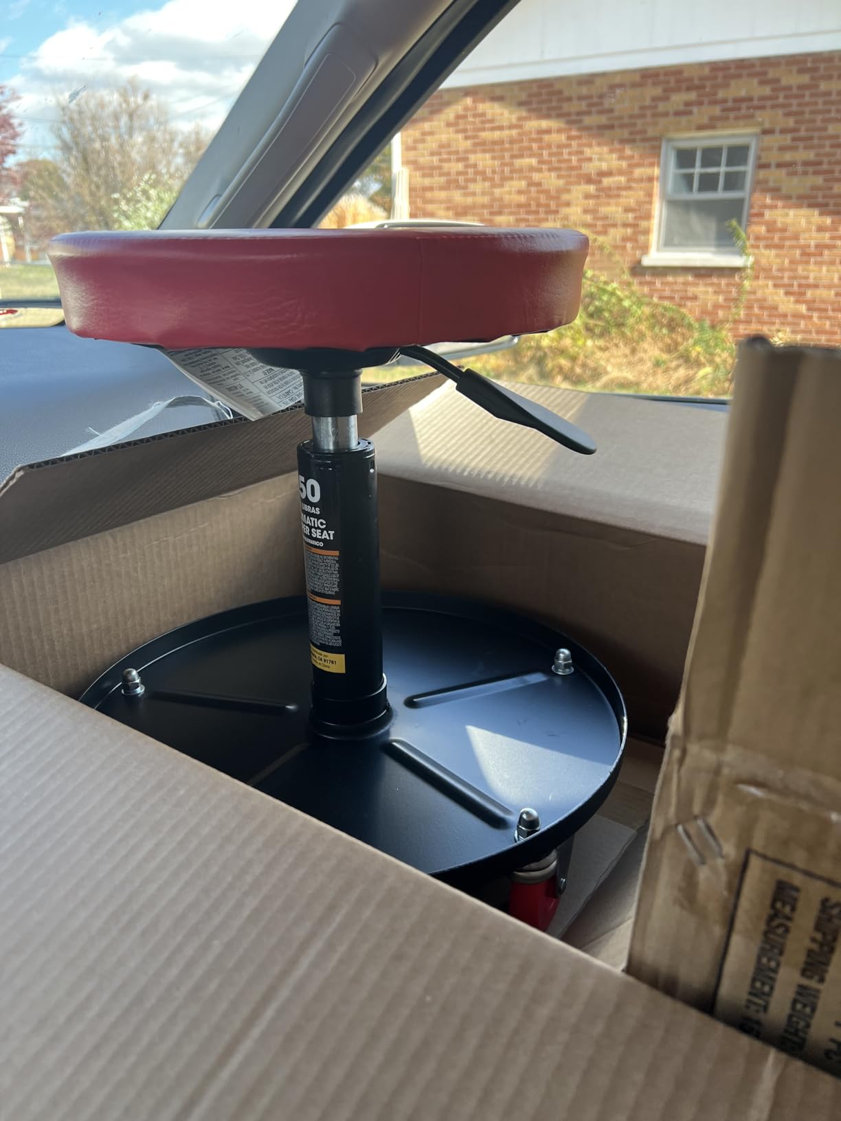 Torin ATRHL6201B Heavy Duty Rolling Pneumatic Creeper Garage/Shop Seat: Padded Adjustable Mechanic Stool with Tool Tray Storage, Red 250 LBS customer photo 1